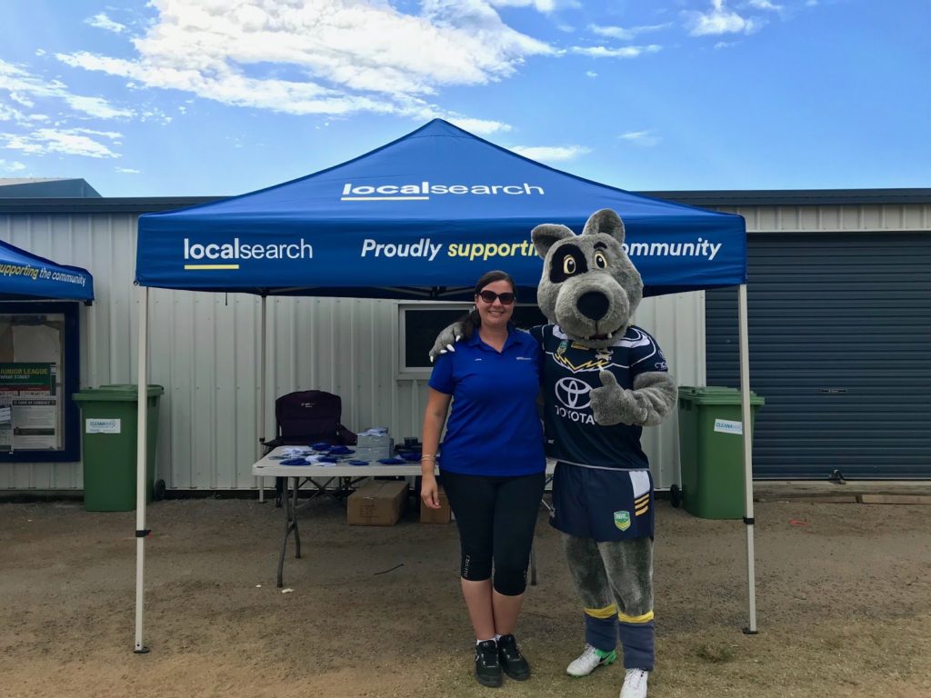 Bluey the Cattle Dog Cowboys mascot with Localsearch consultant
