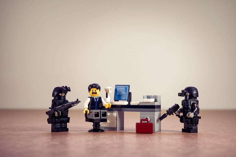 Lego worker being arrested by FBI