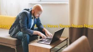 Man Staying Up To Date With The News